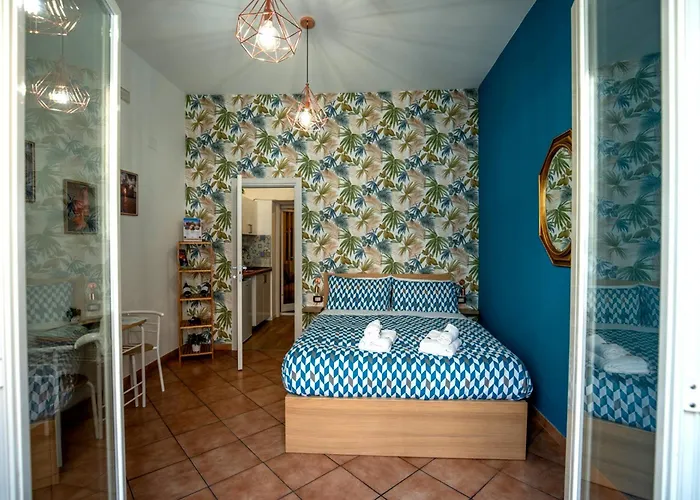 Sabbie dell'Etna - Eleganza e Comfort nel Cuore di Catania con Parcheggio Privato